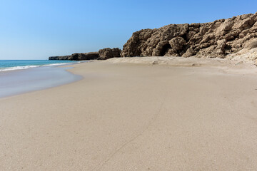 Scenic view of a wild beach along the Ras Al Jinz coast in Oman. Ideal for travel concepts. Ample copy space for custom text, titles, or graphics