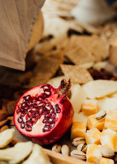 pomegranate and cheese on charcuterie spread