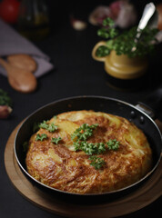 Traditional Spanish dish tortilla on the table