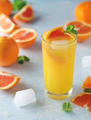 Red oranges juice with mint and ice