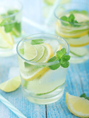 Glasses with lemon and lime lemonade