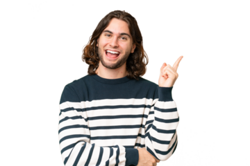 Young handsome man over isolated background happy and pointing up