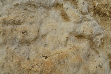 Enduit de plâtre sur un mur ancien.