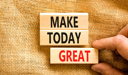 Motivation and Make today great symbol. Concept words Make today great on wooden blocks on a...