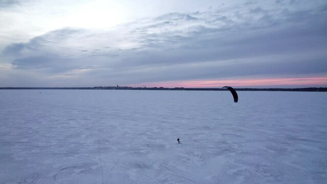 Kite skiing on a frozen Lake Monona in Madison, WI. 