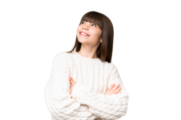 Little caucasian girl over isolated background looking up while smiling