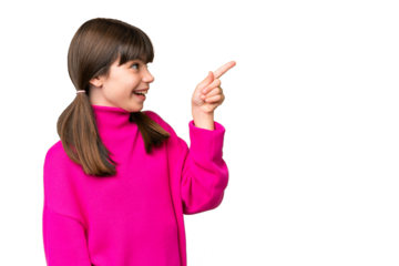 Little caucasian girl over isolated background pointing away