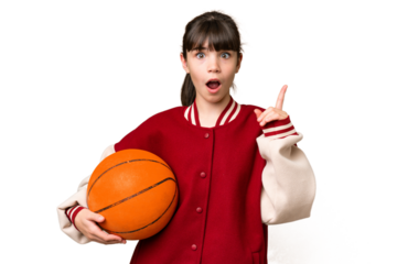 Little caucasian girl playing basketball over isolated background thinking an idea pointing the finger up