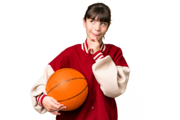 Little caucasian girl playing basketball over isolated background and looking up