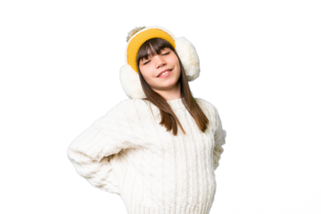 Little caucasian girl wearing winter muffs over isolated background suffering from backache for having made an effort
