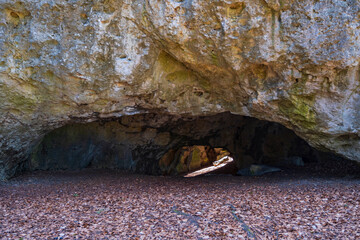 View of the entrance to the Esper cave in the forest near Gößweinstein/Germany in spring