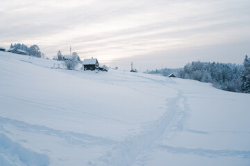 Snow covered field in Switzerland- the perfect weather for hiking