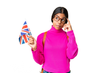 Young African American woman holding an United Kingdom flag over isolated chroma key background thinking an idea