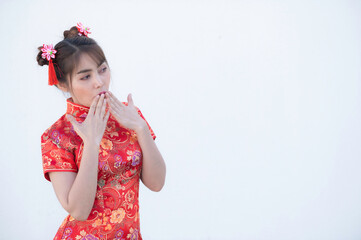 Portrait beautiful asian woman in Cheongsam dress on white background,Thailand people,Happy Chinese new year concept,Happy  asian lady in chinese traditional dress