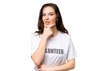 Young volunteer caucasian woman over isolated background thinking