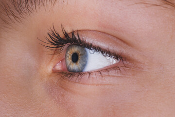 Fototapeta na wymiar Close Up Of A Blue Eye Of A Woman