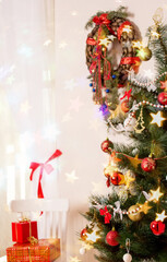 New Year's gifts and a Christmas tree near the window. Place for text with congratulations on the holiday.
