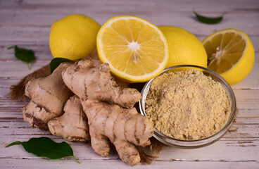 Fresh and dried ginger root and lemon.

