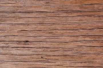 Old wooden background with cracks. Structure of an old wood close up. Brown colored texture natural wood