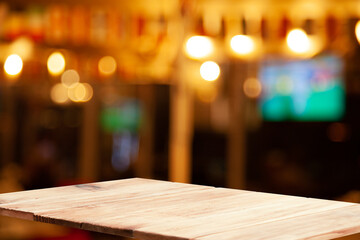dark blurred background with empty table top, cafe restaurant windows. background for your product