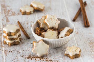 Christmas cinnamon star cookies on a wooden table