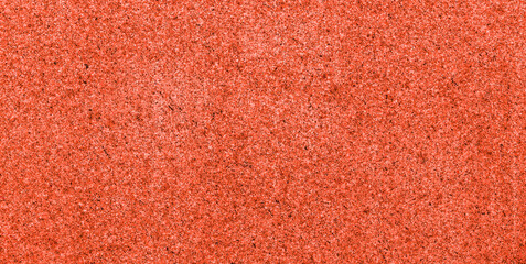 Fototapeta premium Red grainy abstract texture and background.