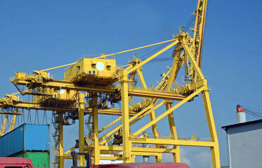 Fototapeta na wymiar loading unloading in port inside with crane.