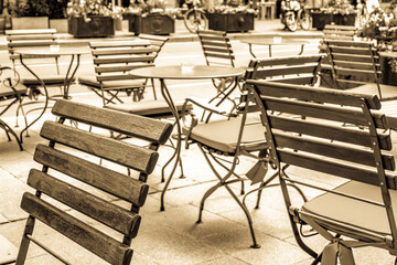Fototapeta na wymiar table and chairs at a sidewalk cafe