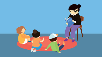 The teacher reads a book to children sitting on the carpet