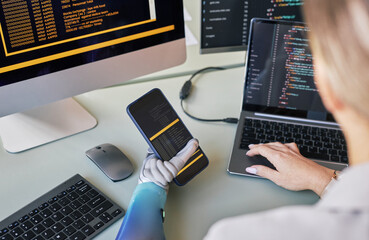 Female scientist working on mobile application for people with bionic arms
