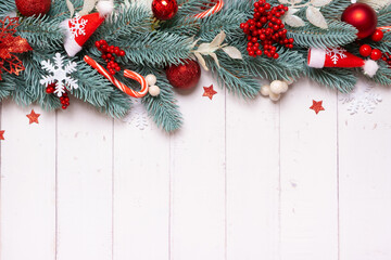 Christmas composition made from pine tree, stars and festive decorations top view. Xmas flat lay