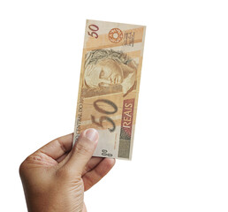 Male hand holding a 50 reais banknote in a studio. Money from Brazil. 3d rendering. Transparente background.