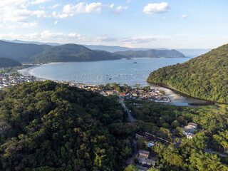 beautiful fishermen's beach formed in a bay in the mountains, Pereque, Guarujá, Brazil