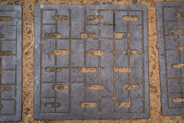 Road surface square openwork tiles large top view.