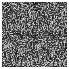 Abstract pattern of white tangled lines-waves on a black background.