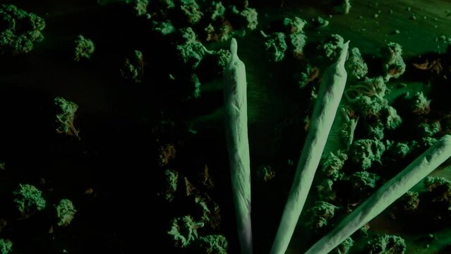 Drugs and marijuana, sbd or thc bumps. Sativa and indica in green neon. Weed and smoking plants, laboratory. Grinder and joints with pipe