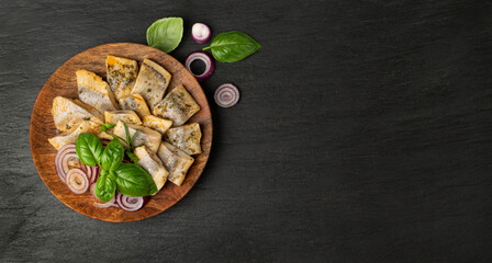 Salted Herring Fillet, Raw Pickled Fish Meat, Marinated Herring on Black Background
