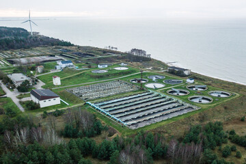 Aerial view of wastewater treatment plant, filtration of dirty or sewage water. Skede, Latvia.