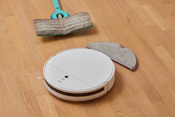 Water tank of a robot vacuum claner. Mop feature with attachment.