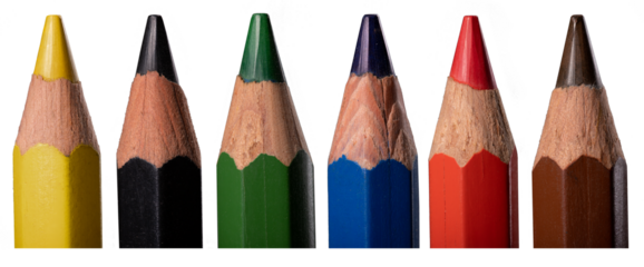 Close-up of well-sharpened pencil crayons on an isolated background