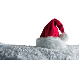 Christmas background of  santa claus hat over the snow