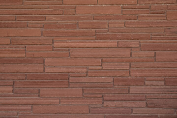 Thin red stone brick background