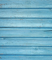 Vintage wood background vertical with peeling paint.