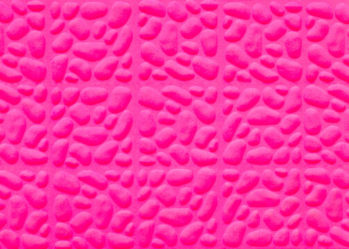 Pink texture background with organic shapes looking like pebbles