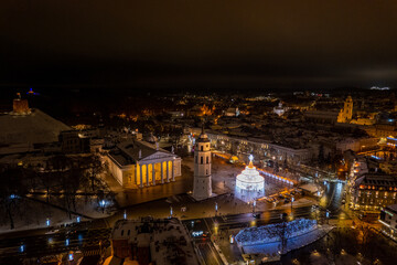 Fototapeta premium Aerial winter night view of Vilnius Christmas Tree, Vilnius old town, Lithuania