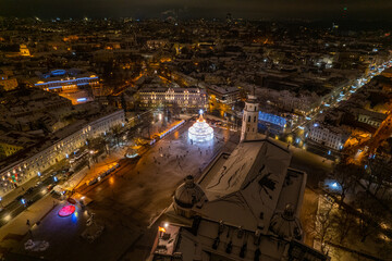 Aerial winter night view of Vilnius Christmas Tree, Vilnius old town, Lithuania