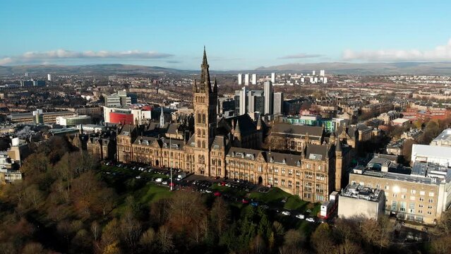 Multiple aerial shots of Glasgow's historic skyline, including Glasgow University, founded in 1451.