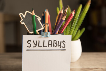 Syllabus inscription and pencils