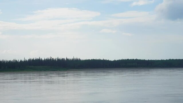 The Aldan River, tributary of the great Siberian Lena River. Smooth strong current abd whirlpools