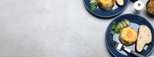 Delicious fish aspic served on grey table, flat lay with space for text. Banner design